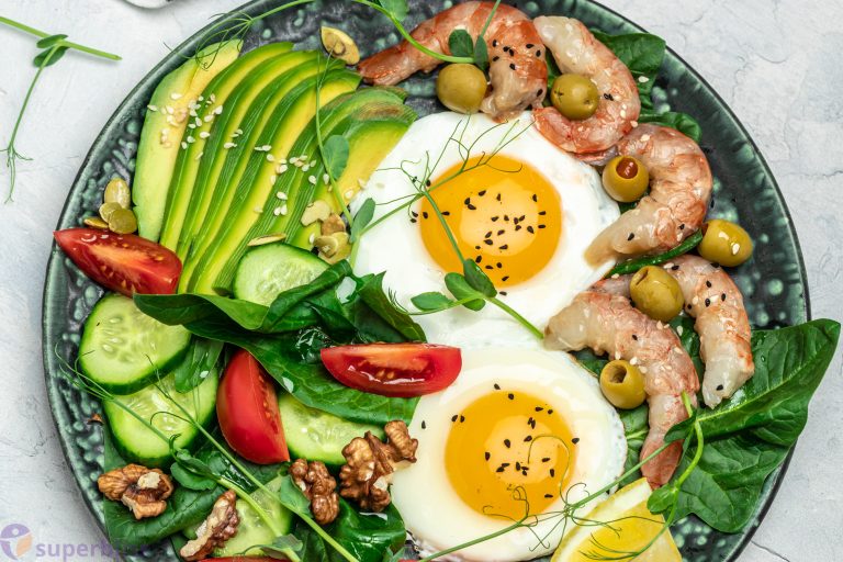 Ketogenic Diet Breakfast Shrimps Prawns Soft Fried Egg Fresh Salad Tomatoes Cucumbers Avocado Dark Background Keto Paleo